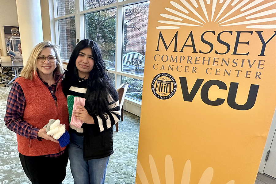 Becky Massey (left) will distribute the headbands crocheted by Shrisha Ramiya to patients.