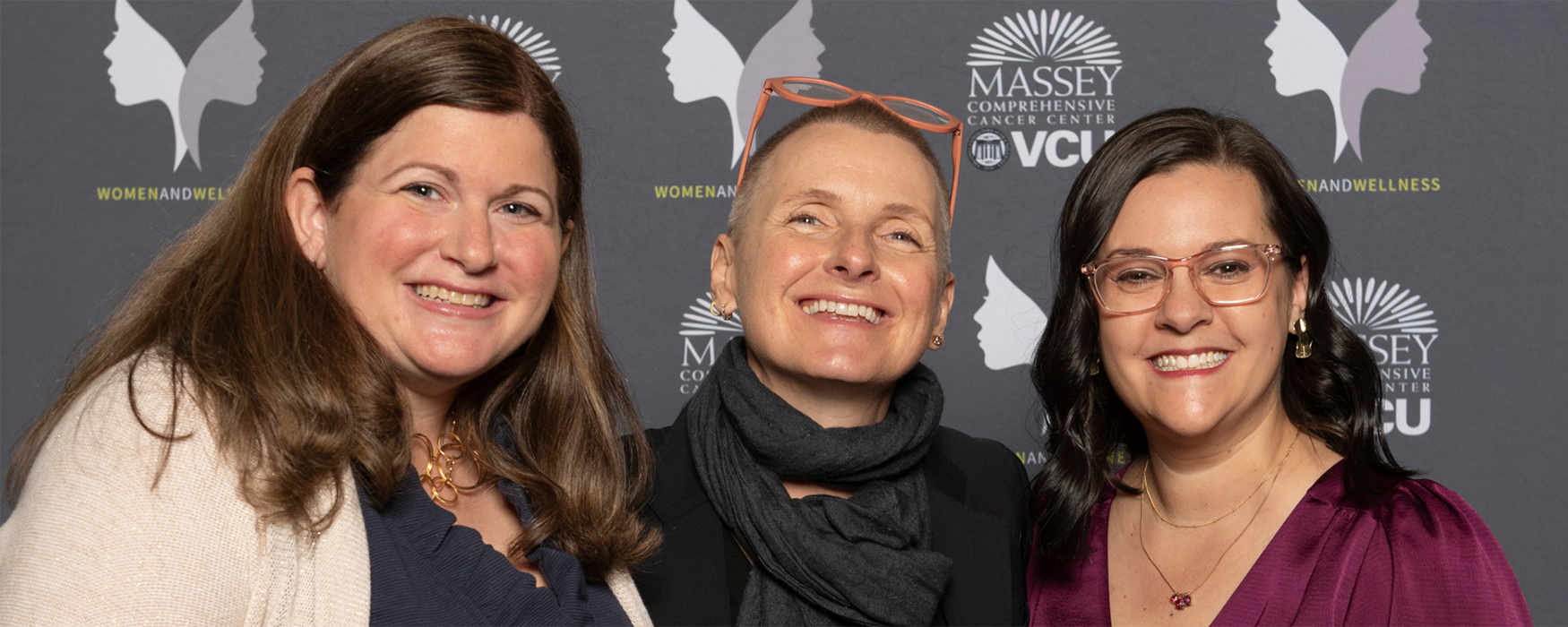 Jill Campbell and Tara Daudani with Elizabeth Gilbert