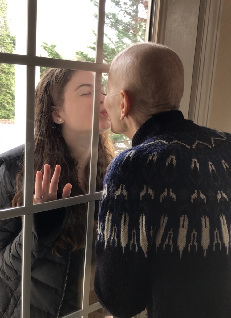 Eleanor Templeton at window with mom