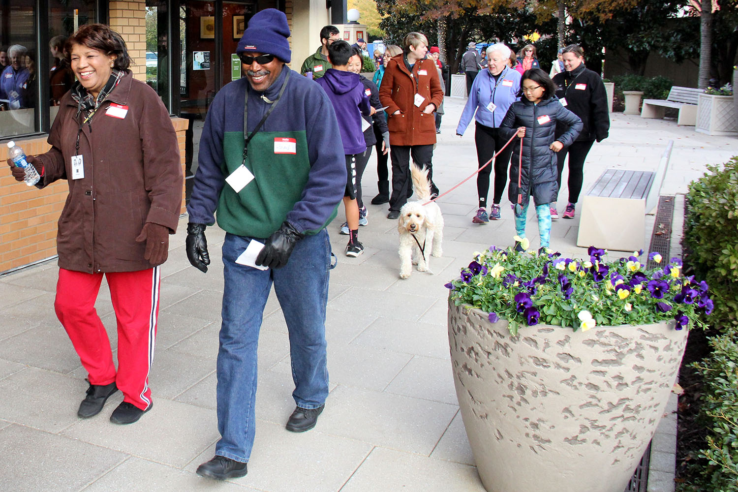 Diverse group walking through a mall in a walking program