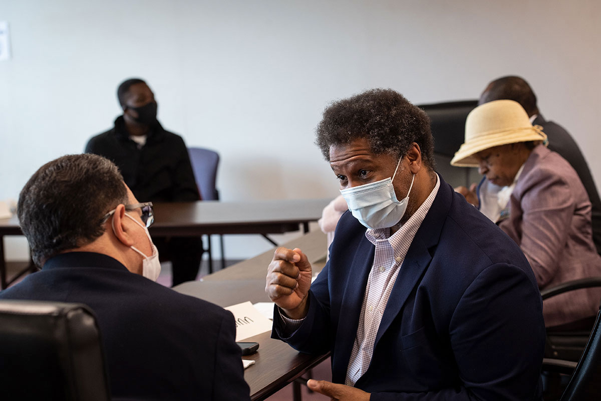 Robert A. Winn, M.D., speaks with community partners at Capital AHEC during a Project COALESCE site visit on April 1, 2021.