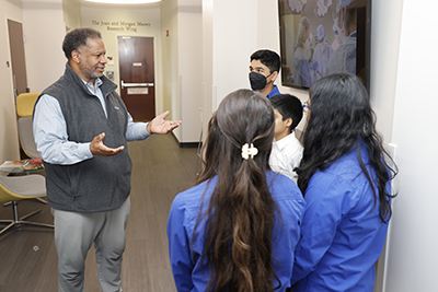 Robert A. Winn, M.D. meets with students from Holman Middle School last year